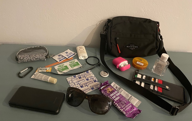 the best travel purse contents laid out on display